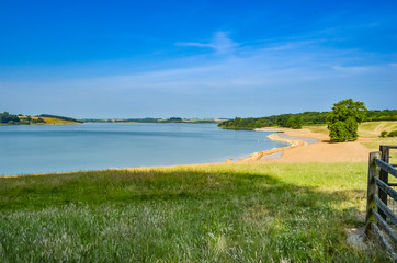 View across Rutland Water a large reservoir in Leicestershire.