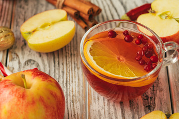 Beautiful composition with glint wine cup and ingridients on wooden table