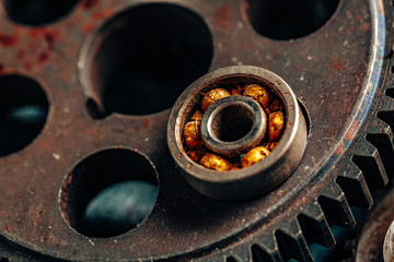 Close up of old rusty car parts on dark background
