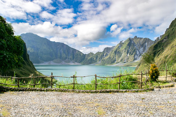 Crater Lake: Overlook near crater of Mount Pinatubo, featuring a large lake in between towering peaks - Luzon, Philippines