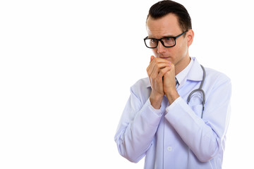 Portrait of young handsome man doctor with eyeglasses