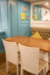 Fototapeta na wymiar Interior design of coffee shop wooden table