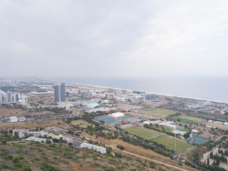 Israel, Haifa Southern District. Aerial panoramic view on a cloudy day.