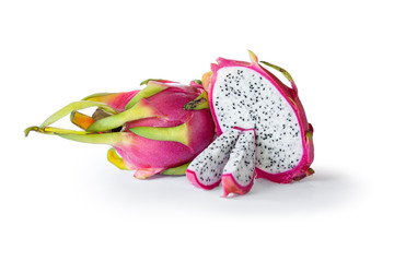 Ripe Pitahaya or Dragon fruit (genus Hylocereus) with slices isolated on the white background