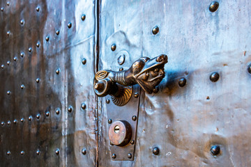 Beautiful door knob, entrance door of Annakirche or Church of Saint Anne in Dueren, North Rhine-Westphalia, Germany