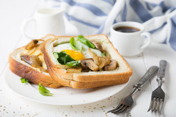 Breakfast sandwich. Fried eggs with toast