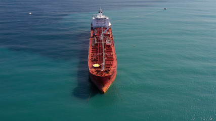 Drone view of oil Chemical Tanker Tied with strings Close to port Aerial Footage, Ashdod, Israel