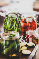 Autumn vegetable pickling and canning. Ingredients for cooking and glass jars with homemade...