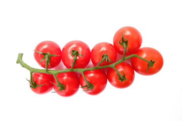 Red cherry tomatoes isolated on white background