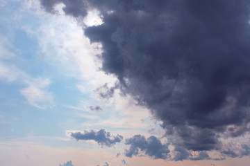 Obraz premium Natural backgrounds: stormy sky. Dark dramatic sky with a stormy gray clouds. 