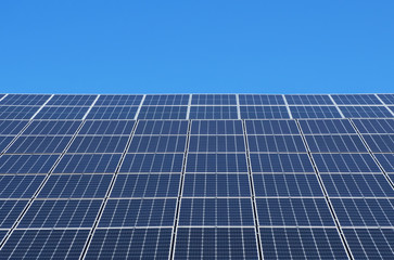 solar panels on a background of blue sky. Renewable energy sources. Modern technologies in energy