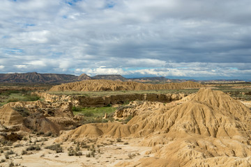 Eroded hills and canyons in the white ground of the Spanish semi-desert Bardenas Reales
