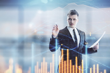 Businessman and forex graph hologram. Double exposure. Concept of financial education and analysis