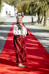 Woman in ukrainian national dress on the red carpet