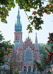 Obraz premium Church spire of Saint Joseph Church (Parish of St. Joseph) - historic Roman Catholic church in south-central part of Krakow, Poland