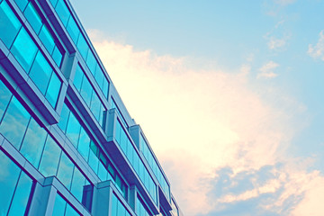 Modern Office building on sky background - obrazy, fototapety, plakaty