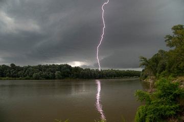 Storm with lightning at the Drava River
