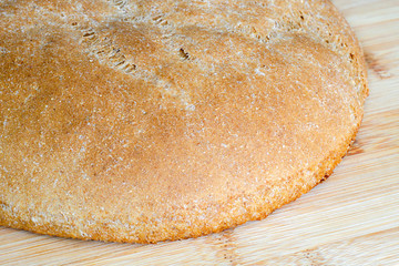 Fresh homemade whole grain whole grain crisp bread. On a light wooden surface. Healthy eating concept. Close-up.