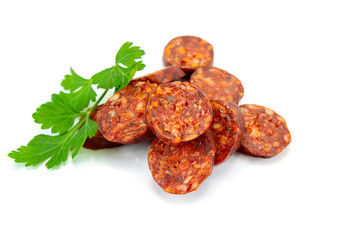 chorizo sliced on a white background