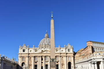 Fototapeta na wymiar Saint Peter Basilica at the Piazza San Pietro with the ancient egyptian Obelisk. Vatican City, Rome, Italy.