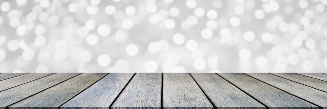 wooden pine table on top over blur background, can be used mock up for montage products display or design layout.