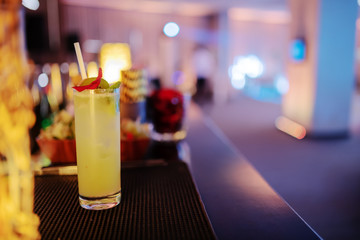Picture of refreshing cocktail on bar.