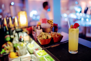 Picture of refreshing cocktail on bar.