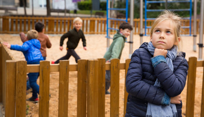 Offended girl on playground