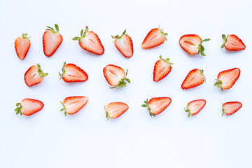 Ripe strawberries on white background.