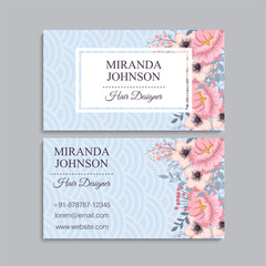 Light blue business card template with pink flowers