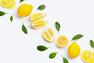 Fresh lemon with green leaves on white.  Copy space