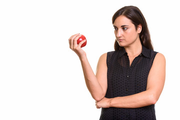 Portrait of young beautiful woman with red apple