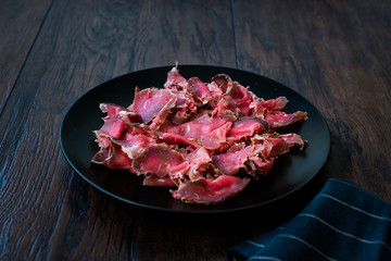 Turkish Bacon Pastirma / Pastrami Slices in Black Plate. Ready to Eat and Serve from Kastamonu and Kayseri.