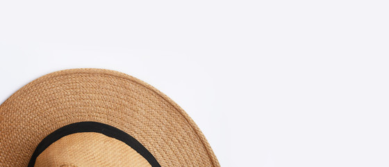 close up of summer straw hat isolated on white background