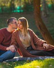 Attractive young woman being kissed