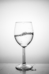 Glass with water up and splash