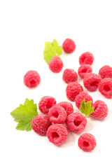 raspberry fruit and leaf on white background