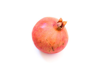 Ripe pomegranate on a white background.