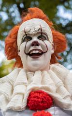 Smiling creepy horror clown