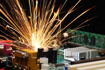 Bright burning sparks fly from the chip
