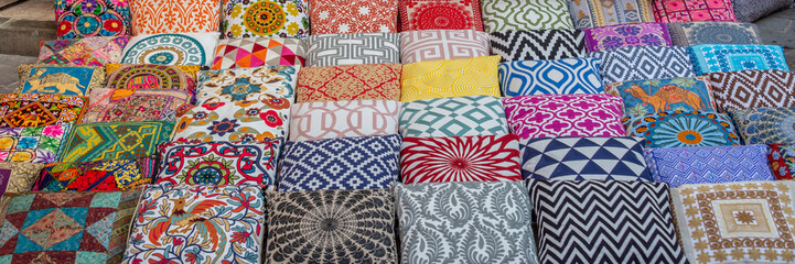Colorful cushions and pillows in Dubai souks, United Arab Emirates