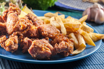 Crispy chicken karaage served with french fries