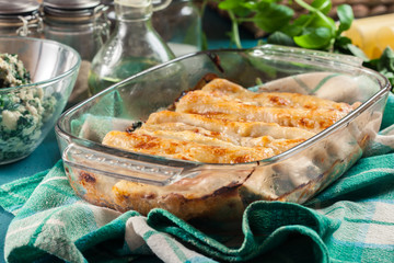 Cannelloni pasta stuffed with spinach and ricotta
