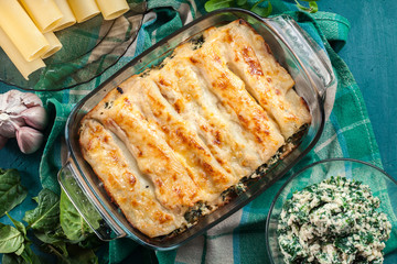 Cannelloni pasta stuffed with spinach and ricotta