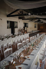 Outdoor catering dinner at the wedding with homemade garnishes decoration