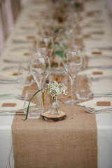 Outdoor catering dinner at the wedding with homemade garnishes decoration