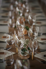 Outdoor catering dinner at the wedding with homemade garnishes decoration
