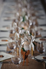 Outdoor catering dinner at the wedding with homemade garnishes decoration