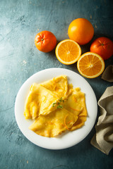 Homemade crepes with orange sauce