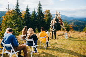 Wedding ceremony in rustic style.